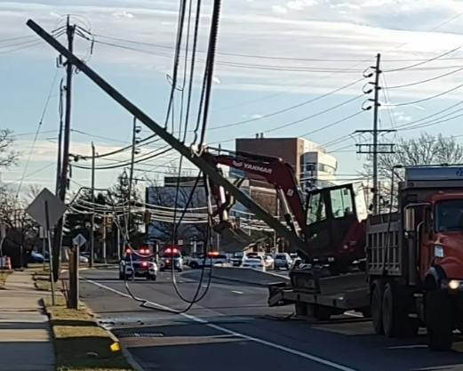 An Excavator Pulls Down Power Lines Causing Power Outages In Toms River ...